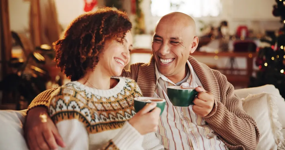 Couple enjoying hot cup of chocolate