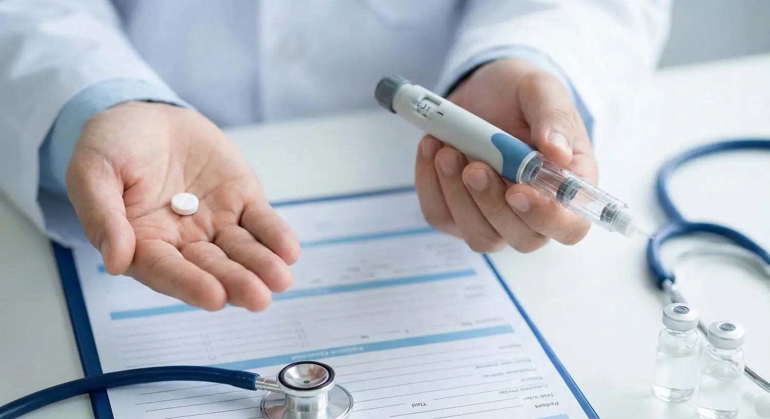 Doctor holding a white pill and an injection pen to compare oral versus injectable medication options.
